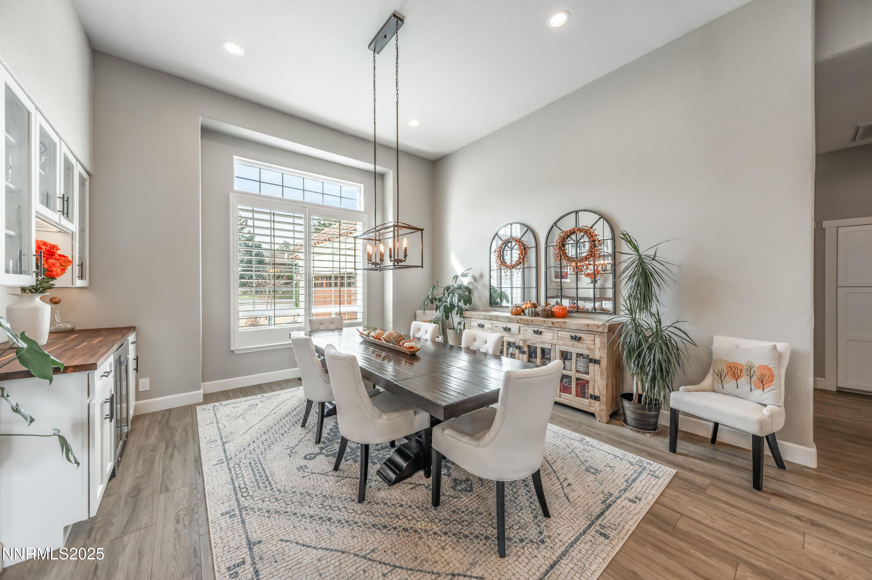 30 Calla Lily Court Reno, NV 89511 - Photo 13 of 34 a view of a dining room with furniture window and wooden floor