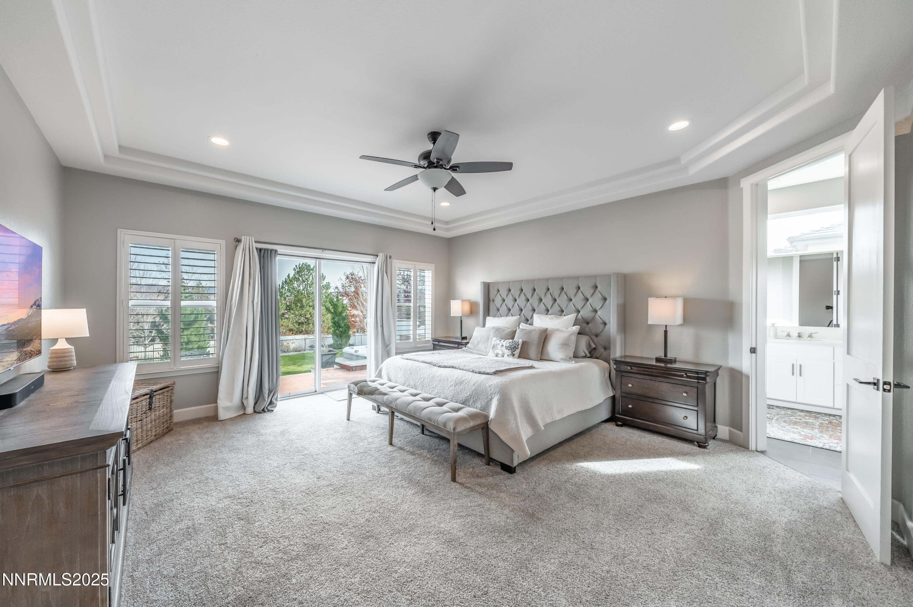 30 Calla Lily Court Reno, NV 89511 - Photo 15 of 34 a bed room with bed and a large window