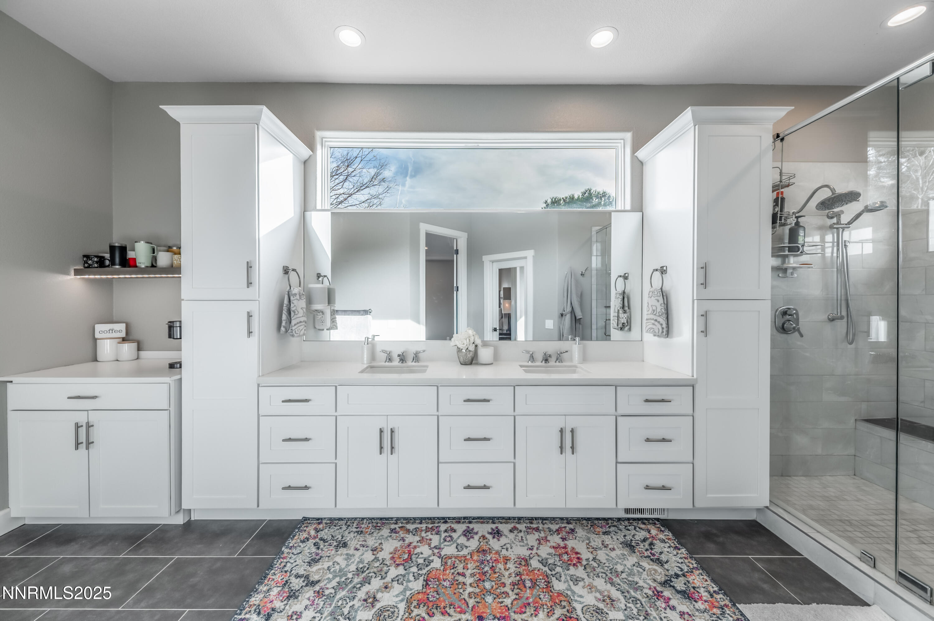 30 Calla Lily Court Reno, NV 89511 - Photo 16 of 34 a spacious bathroom with a double vanity sink mirror and double