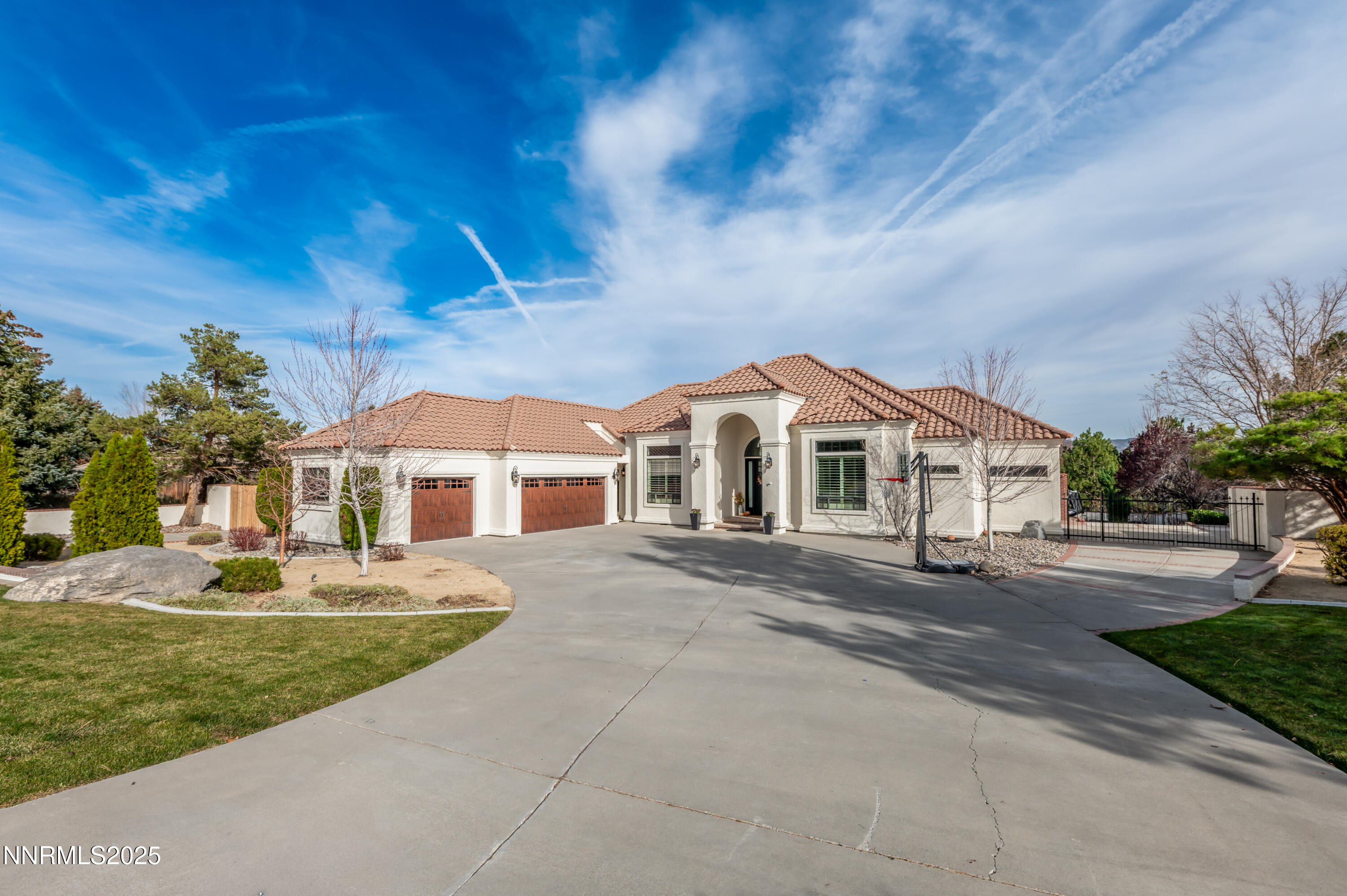 30 Calla Lily Court Reno, NV 89511 - Photo 2 of 34 a front view of a house with garden