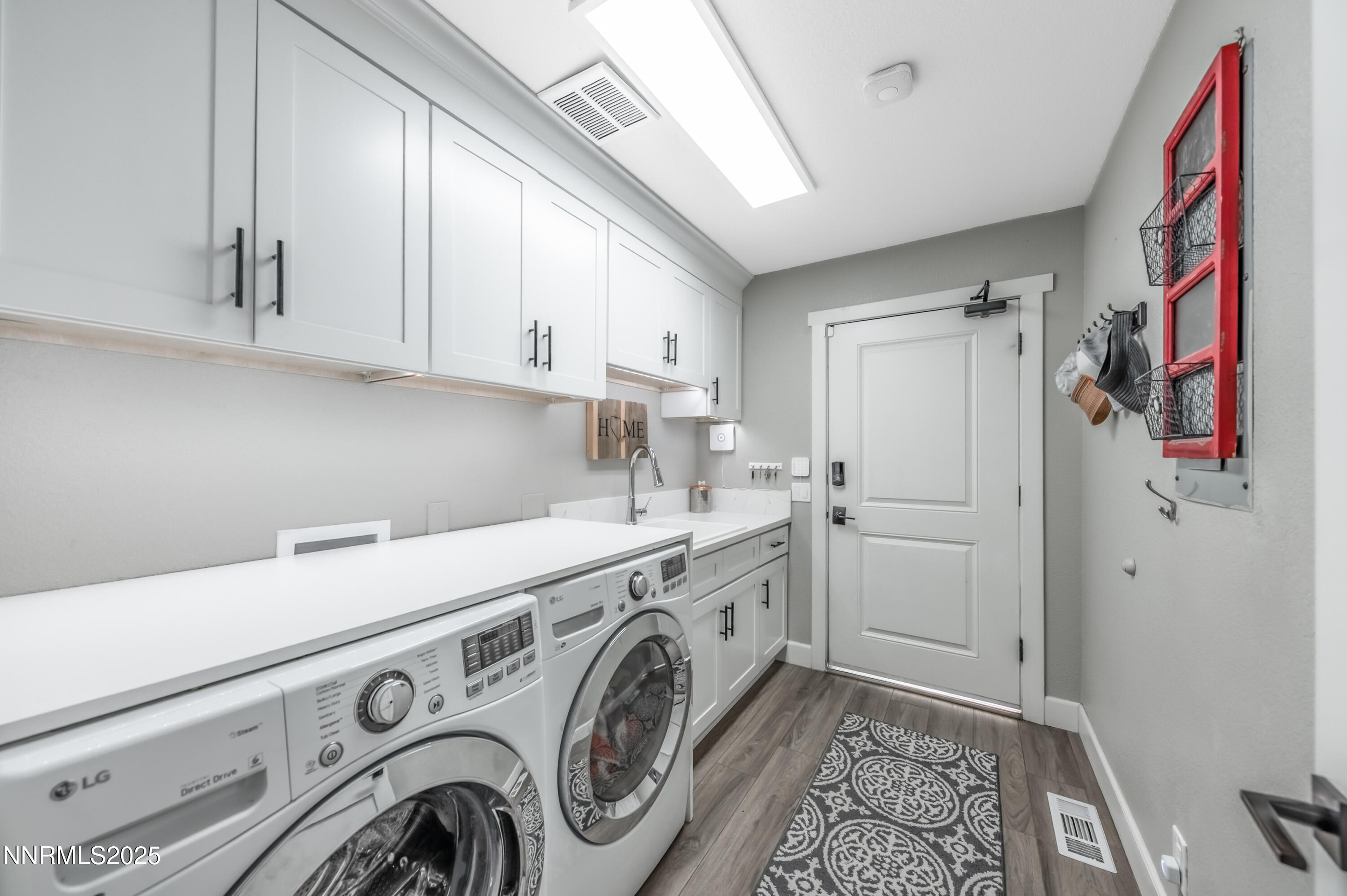 30 Calla Lily Court Reno, NV 89511 - Photo 24 of 34 a utility room with dryer and washer