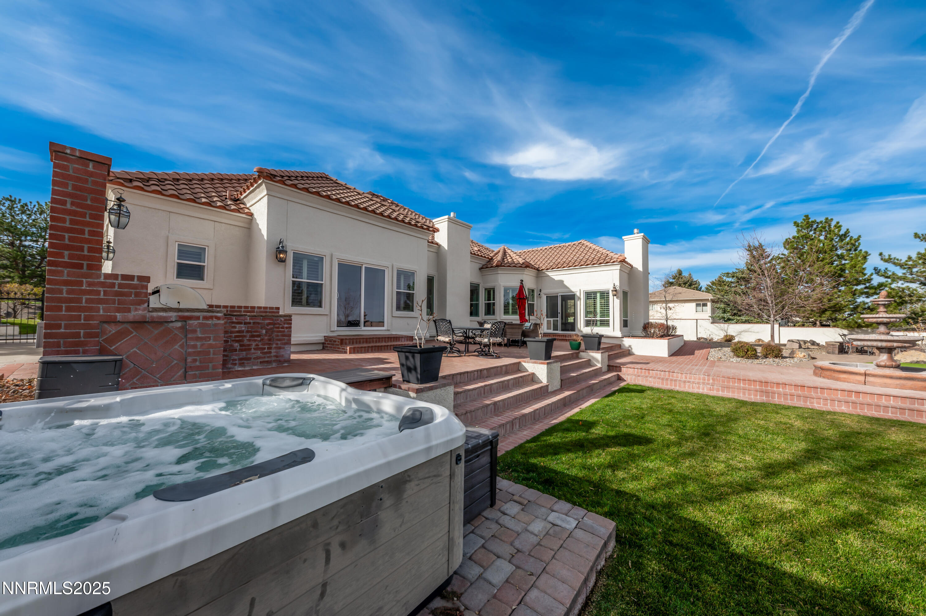 30 Calla Lily Court Reno, NV 89511 - Photo 25 of 34 a view of a house with backyard porch and sitting area