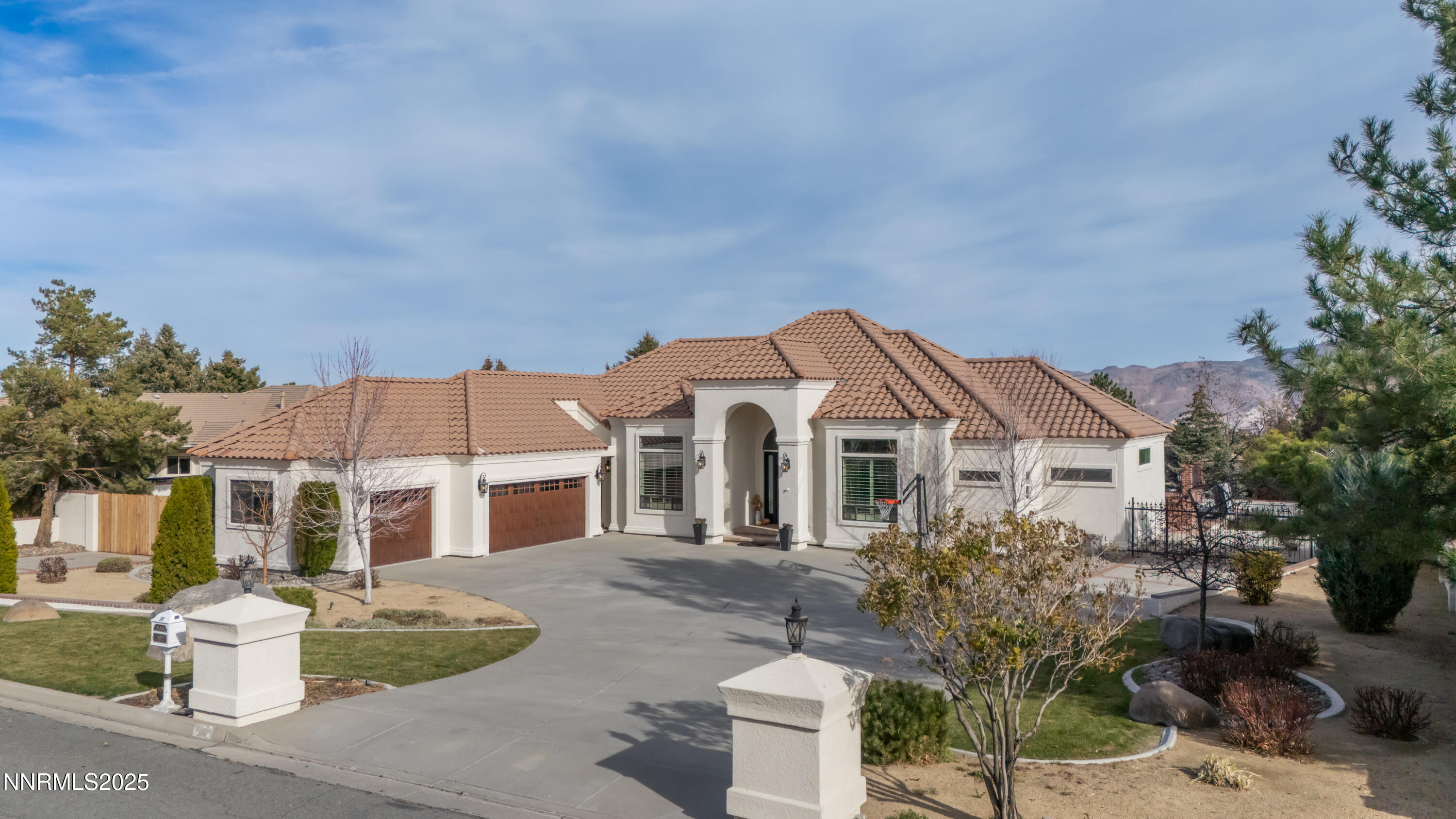 30 Calla Lily Court Reno, NV 89511 - Photo 34 of 34 a front view of a house with a yard and fountain