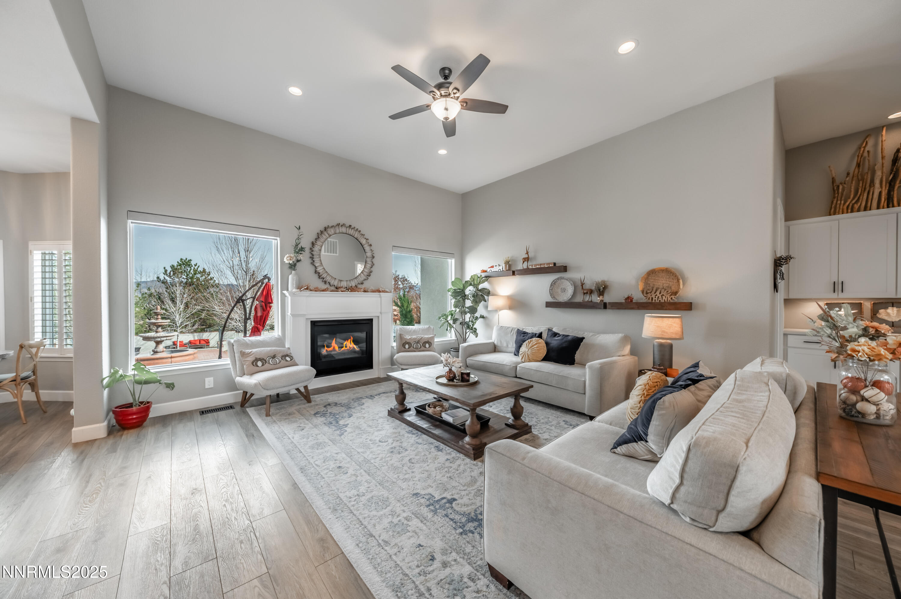 30 Calla Lily Court Reno, NV 89511 - Photo 4 of 34 a living room with furniture and a fireplace