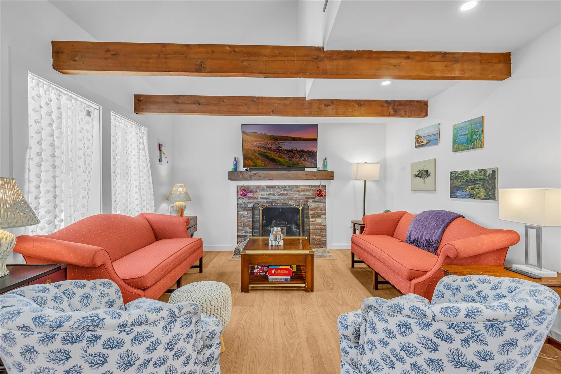 82 Old Fields Road Sandwich, MA 02563 - Photo 17 of 34 a living room with furniture and a fireplace