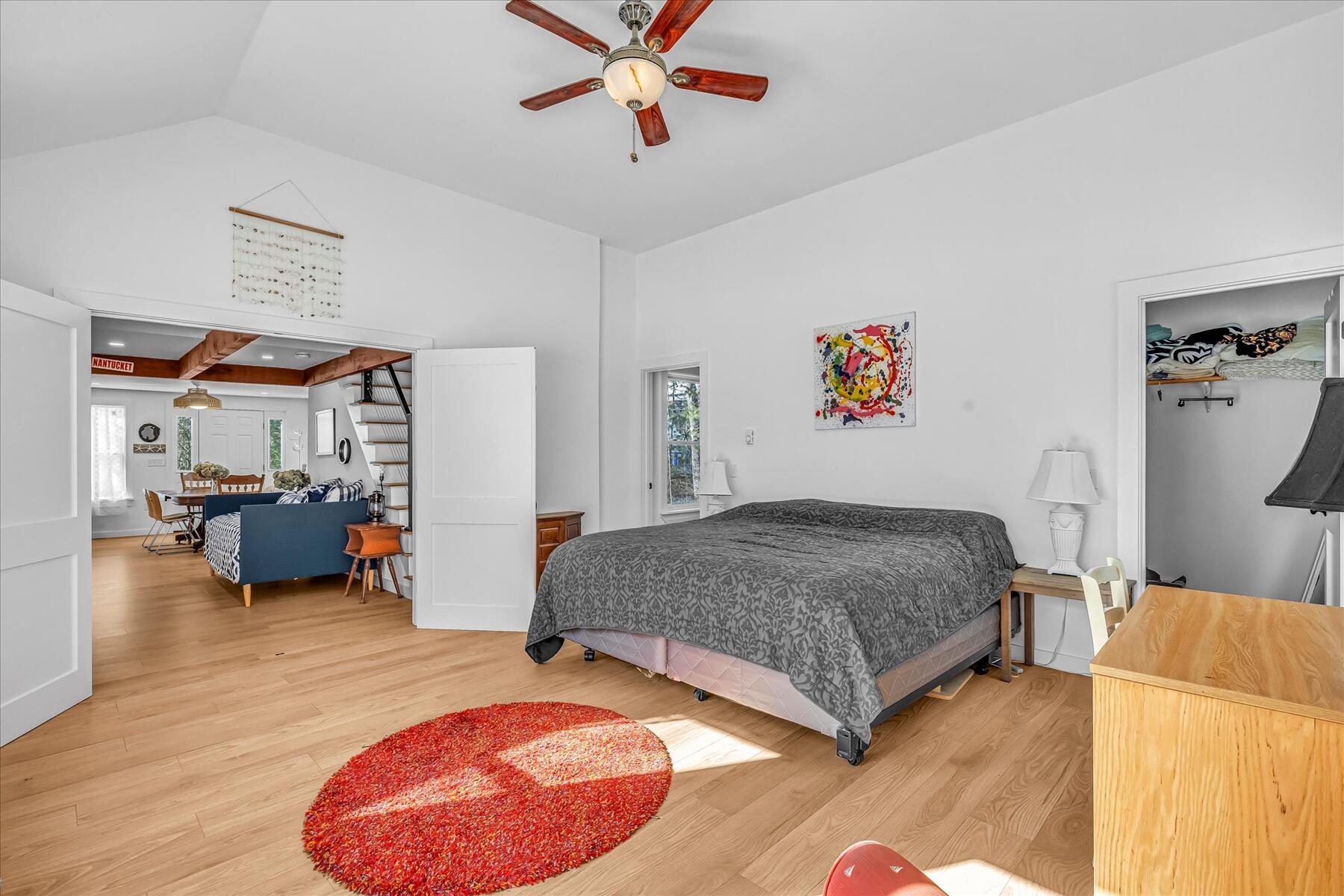 82 Old Fields Road Sandwich, MA 02563 - Photo 21 of 34 a bedroom with furniture and a wooden floor