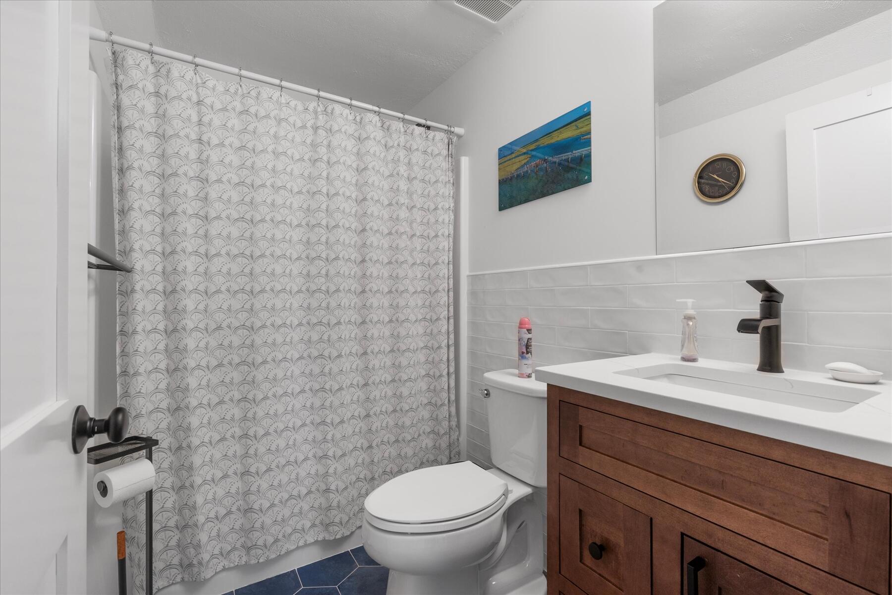 82 Old Fields Road Sandwich, MA 02563 - Photo 29 of 34 a bathroom with a sink a toilet and a shower