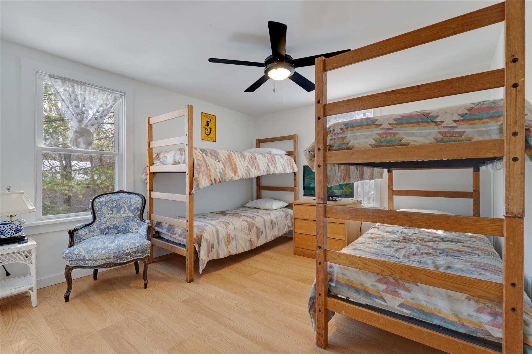 82 Old Fields Road Sandwich, MA 02563 - Photo 30 of 34 a living room with furniture and a large window