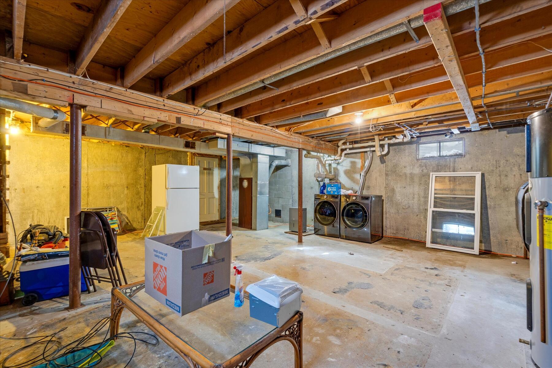 82 Old Fields Road Sandwich, MA 02563 - Photo 34 of 34 a view of a porch with furniture and a garage