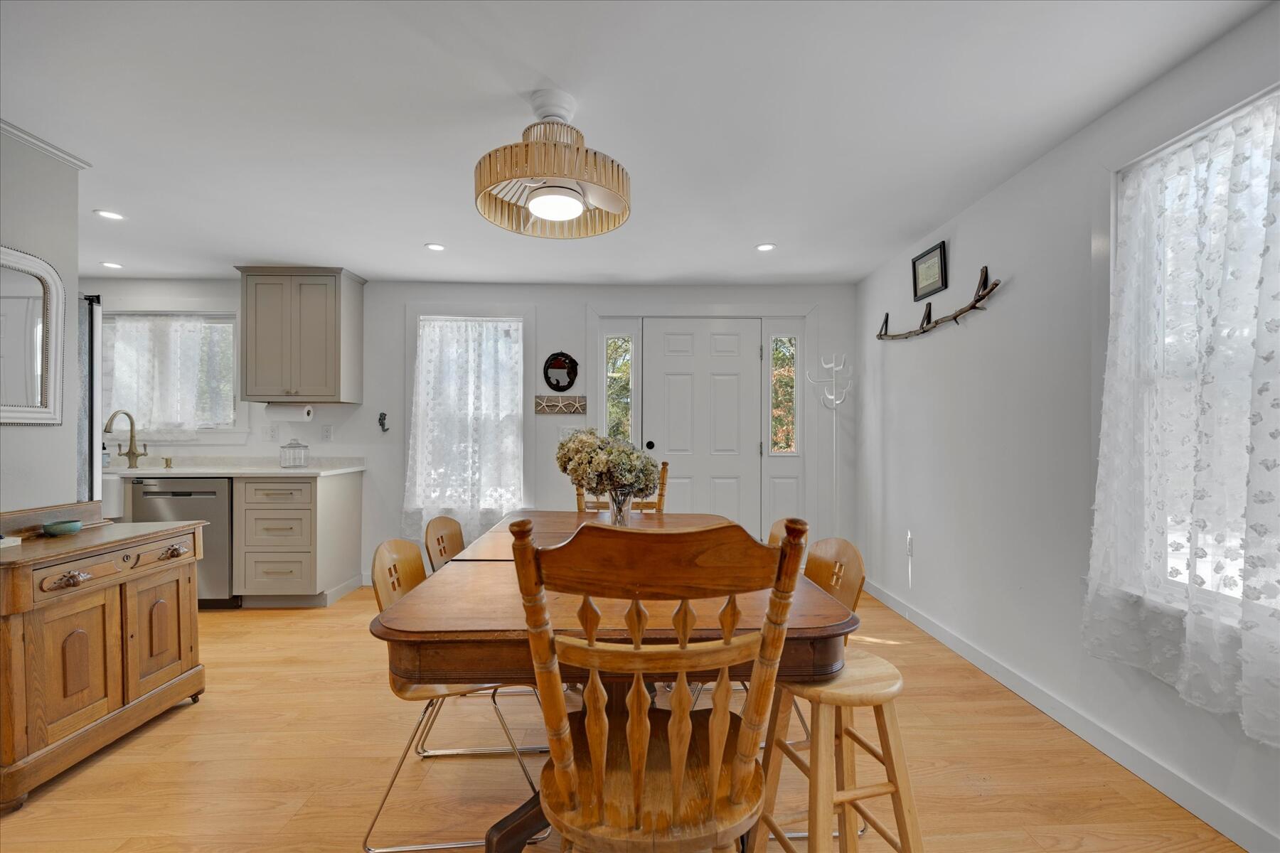 82 Old Fields Road Sandwich, MA 02563 - Photo 10 of 34 a view of a dining room with furniture and wooden floor