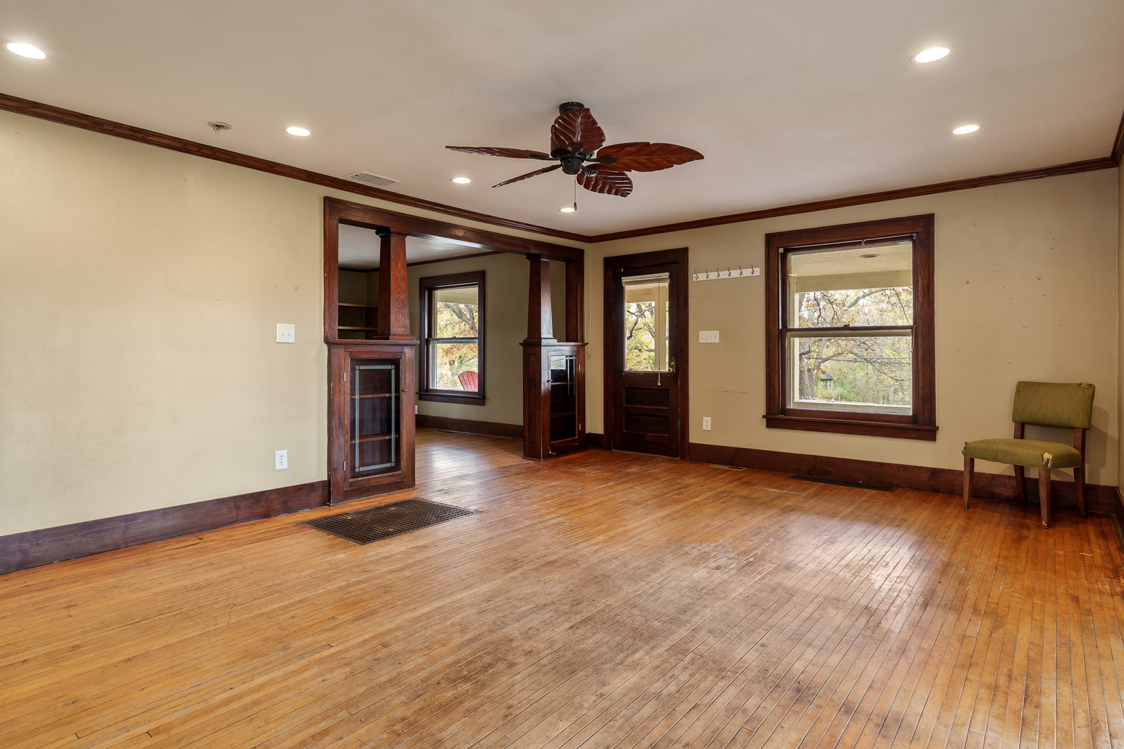 708 South Bluff Road South Beloit, IL 61080 - Photo 11 of 32 a view of an empty room with a window and wooden floor
