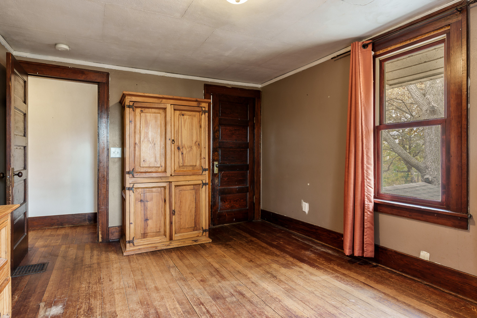 708 South Bluff Road South Beloit, IL 61080 - Photo 20 of 32 an empty room with wooden floor and windows