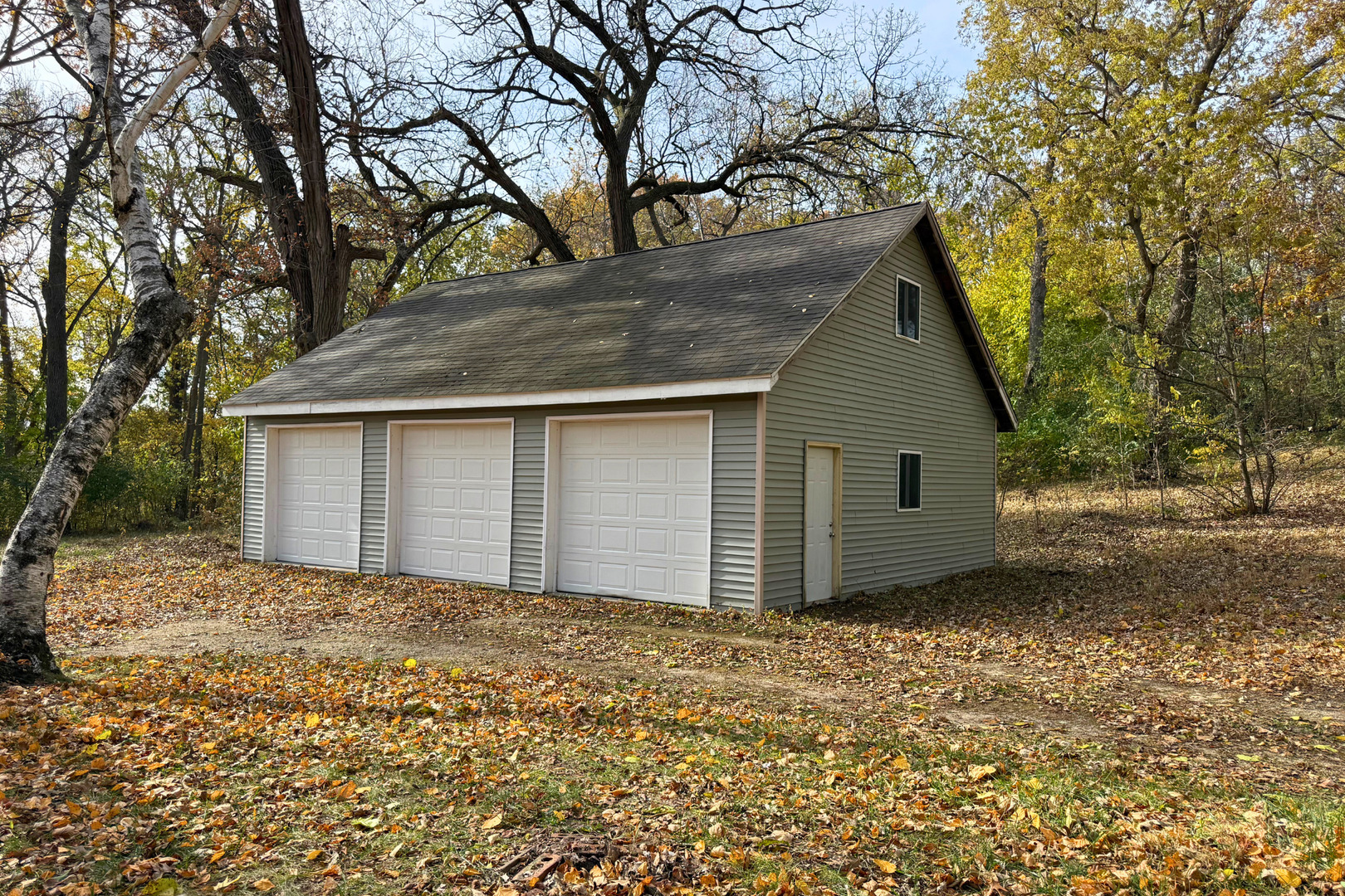 708 South Bluff Road South Beloit, IL 61080 - Photo 30 of 32 a house with a tree in front of the house