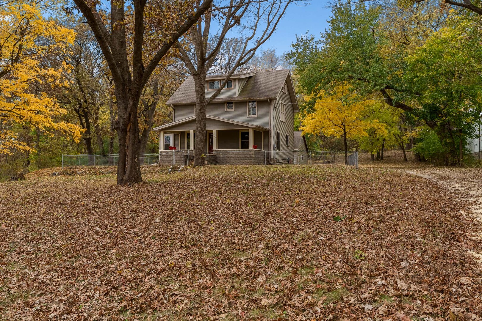 708 South Bluff Road South Beloit, IL 61080 - Photo 3 of 32 a front view of a house with a garden
