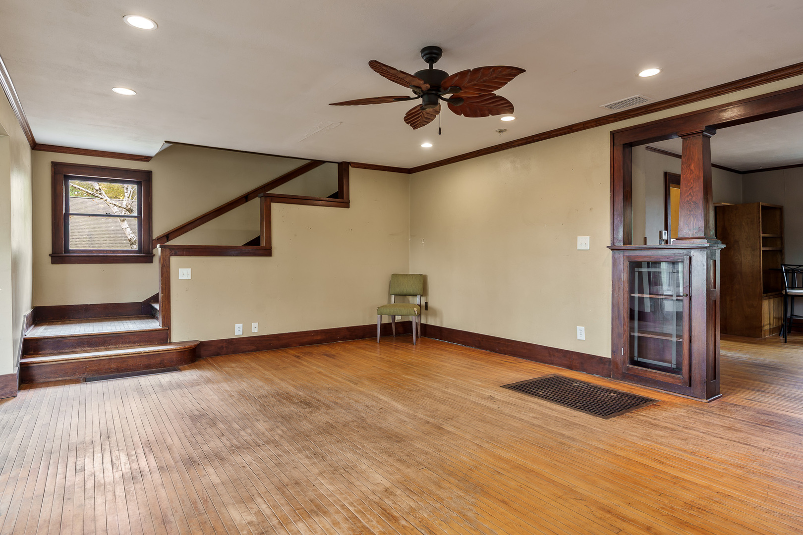 708 South Bluff Road South Beloit, IL 61080 - Photo 9 of 32 a view of an empty room with wooden floor and a window