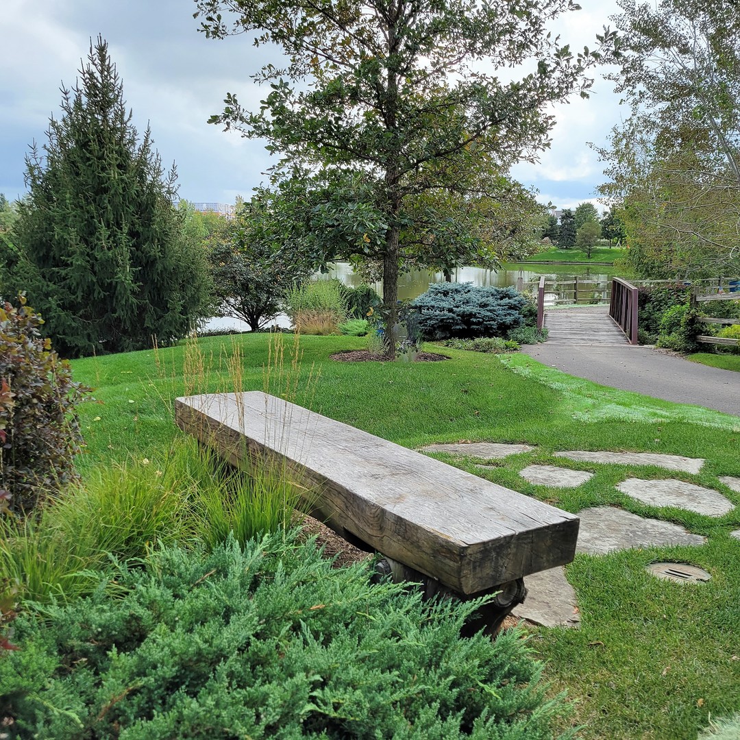 6412 Stony Brook Lane Wonder Lake, IL 60097 - Photo 34 of 36 a view of a wooden deck and bench