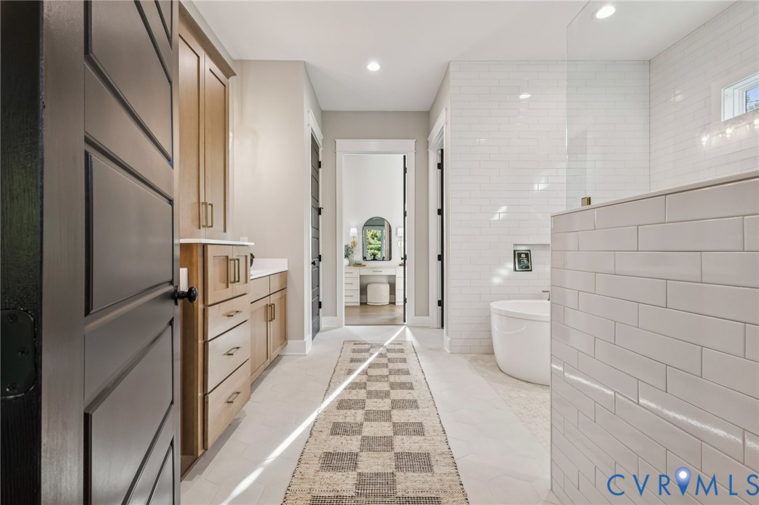 3100 Old Church Road Mechanicsville, VA 23111 - Photo 16 of 32 a bathroom with a bathtub and a shower