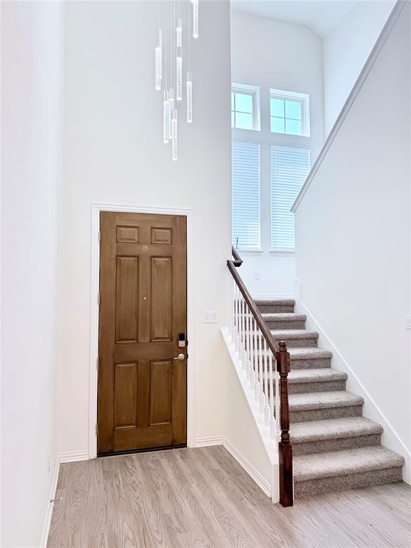 1336 Morning View Road Georgetown, TX 78628 - Photo 2 of 40 A striking two-story entryway offers abundant light and direct staircase access.