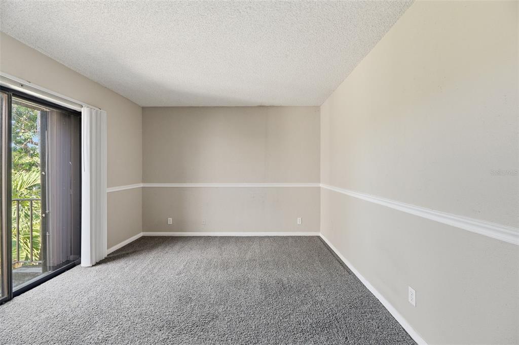 238 Woodland Road Palm Springs, FL 33461 - Photo 16 of 33 an empty room with a empty space and windows