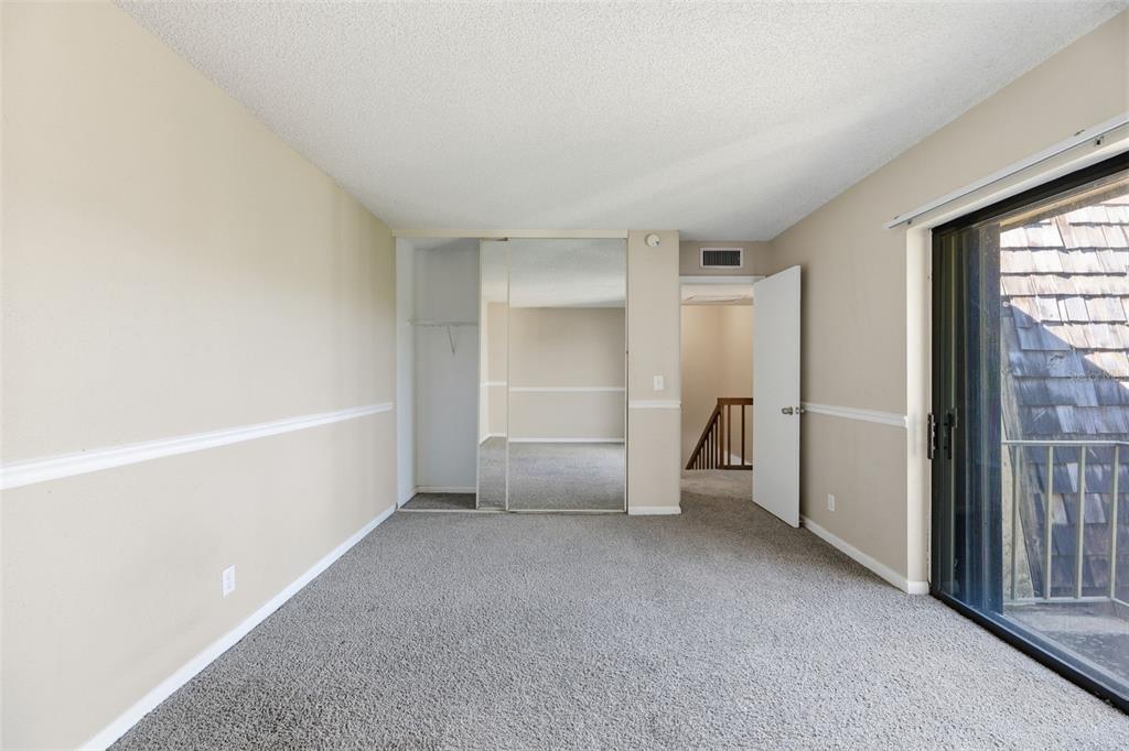 238 Woodland Road Palm Springs, FL 33461 - Photo 18 of 33 a view of an empty room with a window