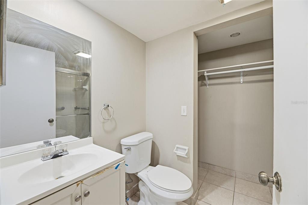 238 Woodland Road Palm Springs, FL 33461 - Photo 21 of 33 a bathroom with a sink a toilet and shower