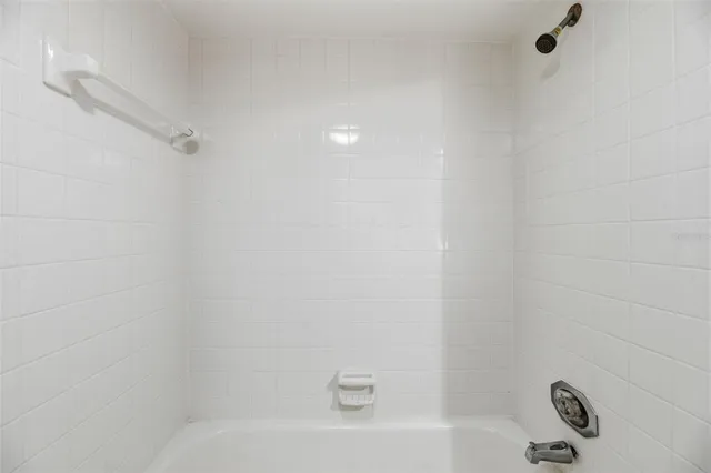 a view of a garden with a small cabin