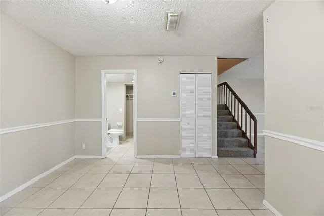 a view of a park with a palm tree