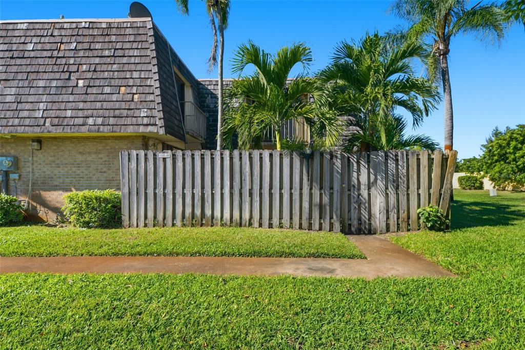 238 Woodland Road Palm Springs, FL 33461 - Photo 26 of 33 a view of a garden with a small cabin