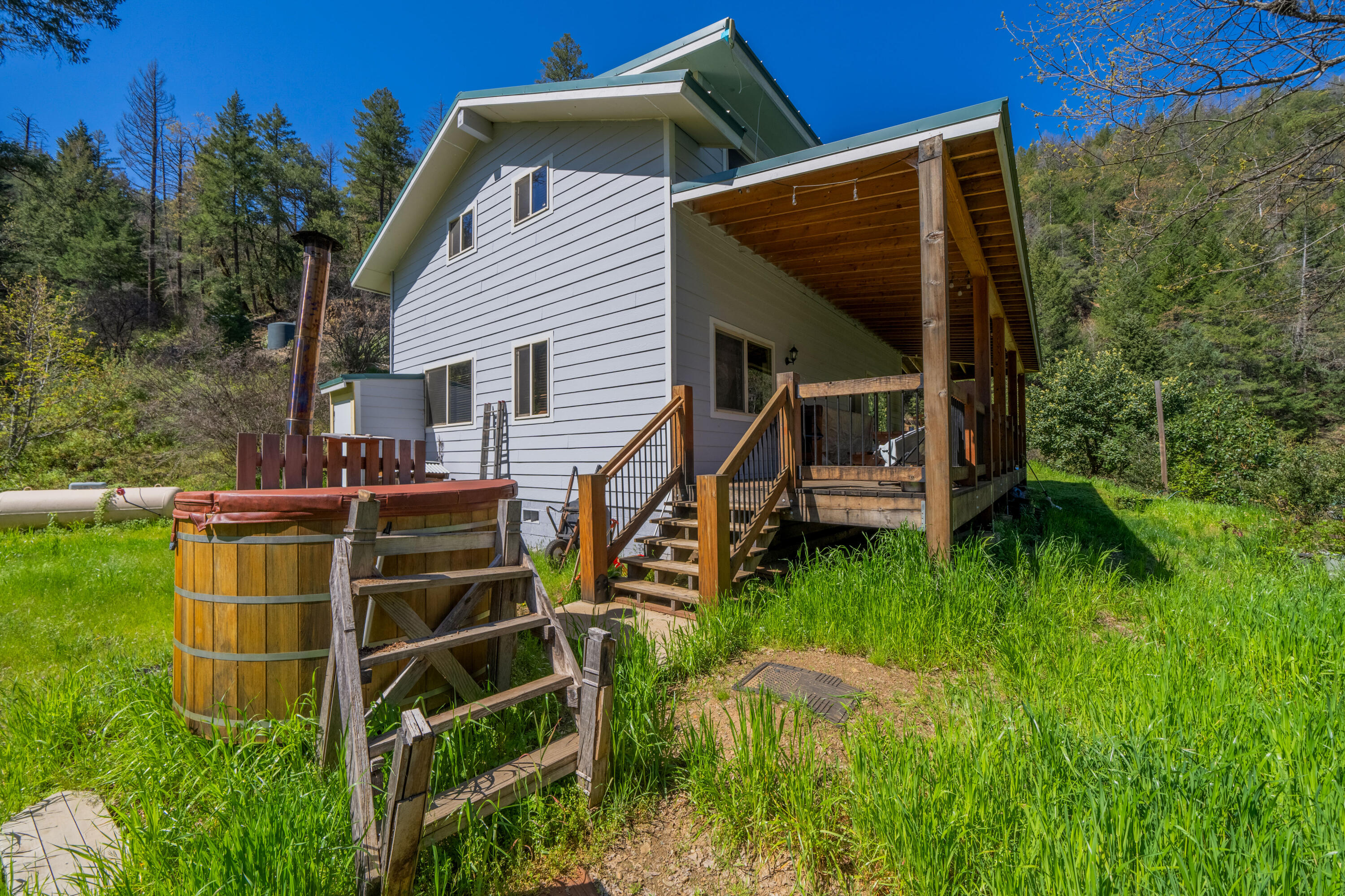 8916 Reading Creek Road Douglas City, CA 96024 - Photo 27 of 48 a view of a house with backyard and sitting area