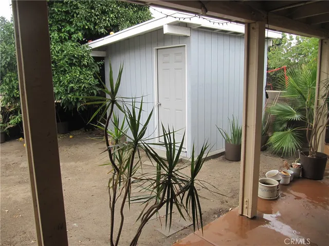 a backyard of a house with seating space