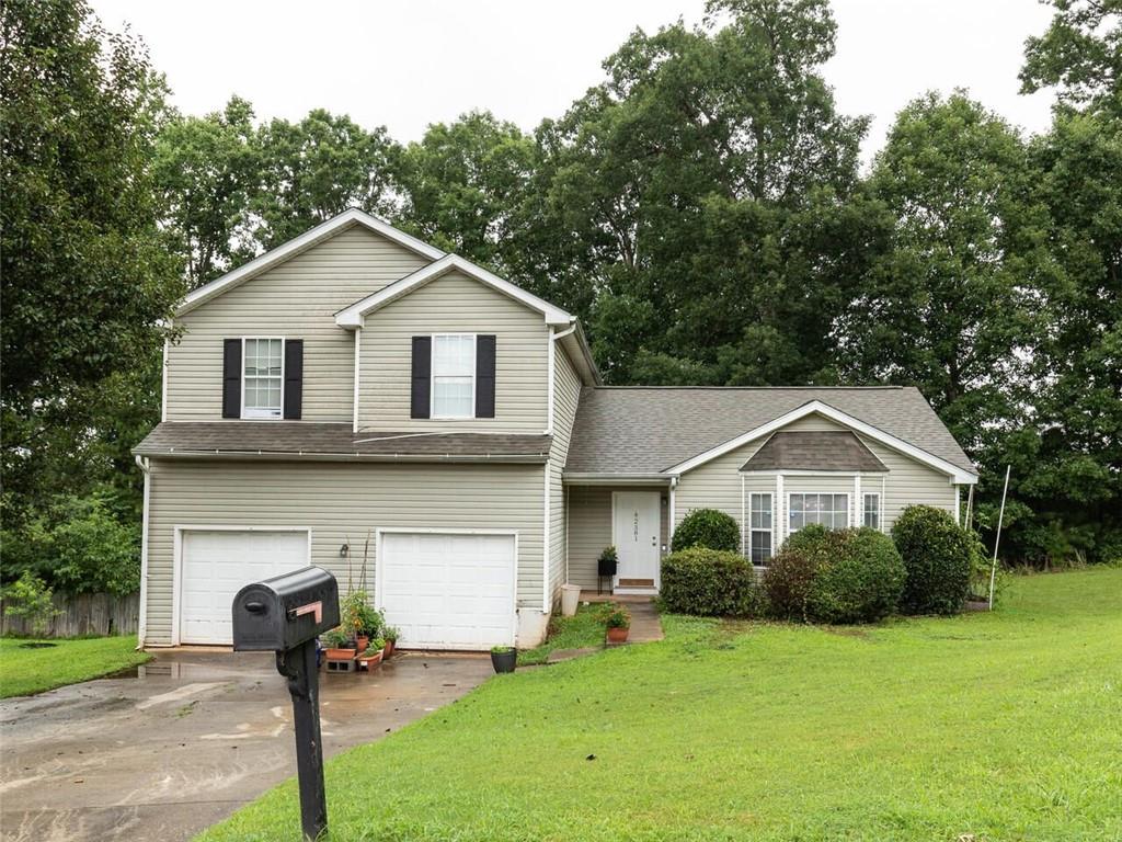 2381 Charleston Terrace Decatur, GA 30034 - Photo 1 of 1 a front view of a house with garden