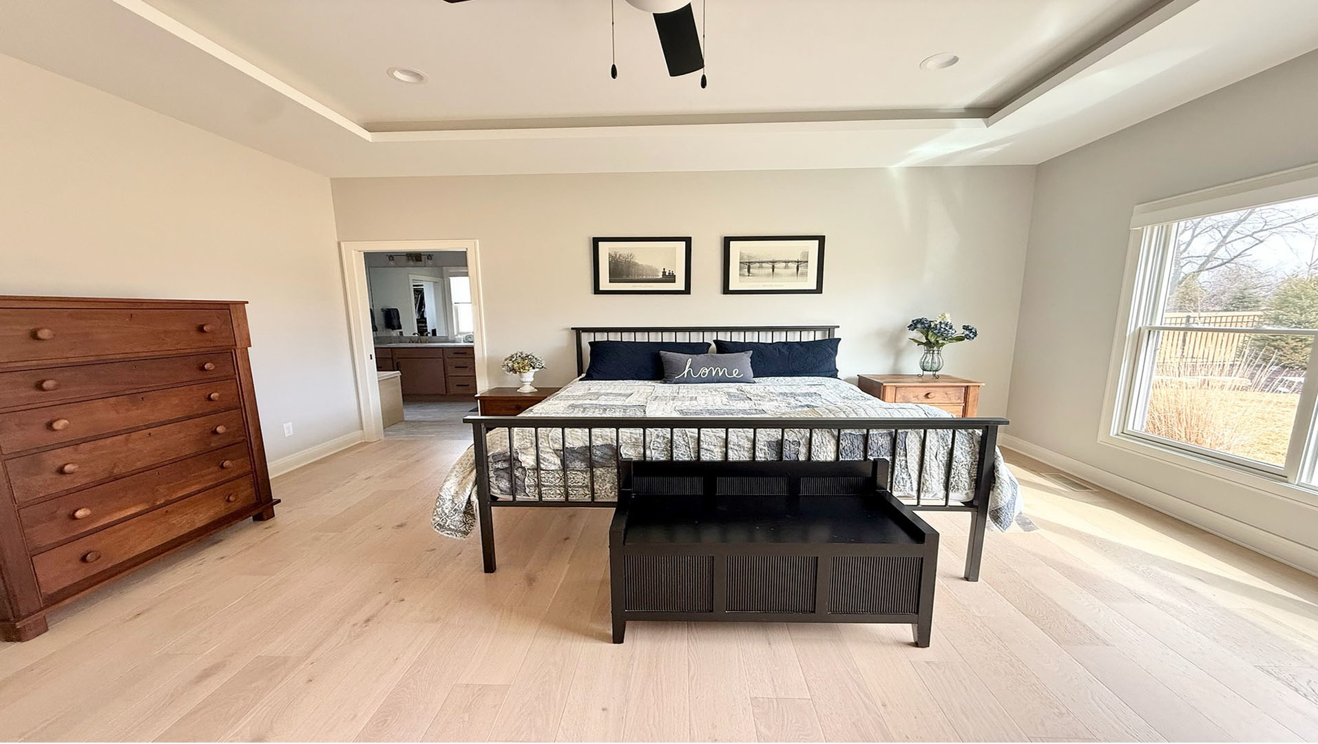 5077 Oak Rdg Court Bettendorf, IA 52722 - Photo 14 of 35 a bedroom with a bed and a dresser in it