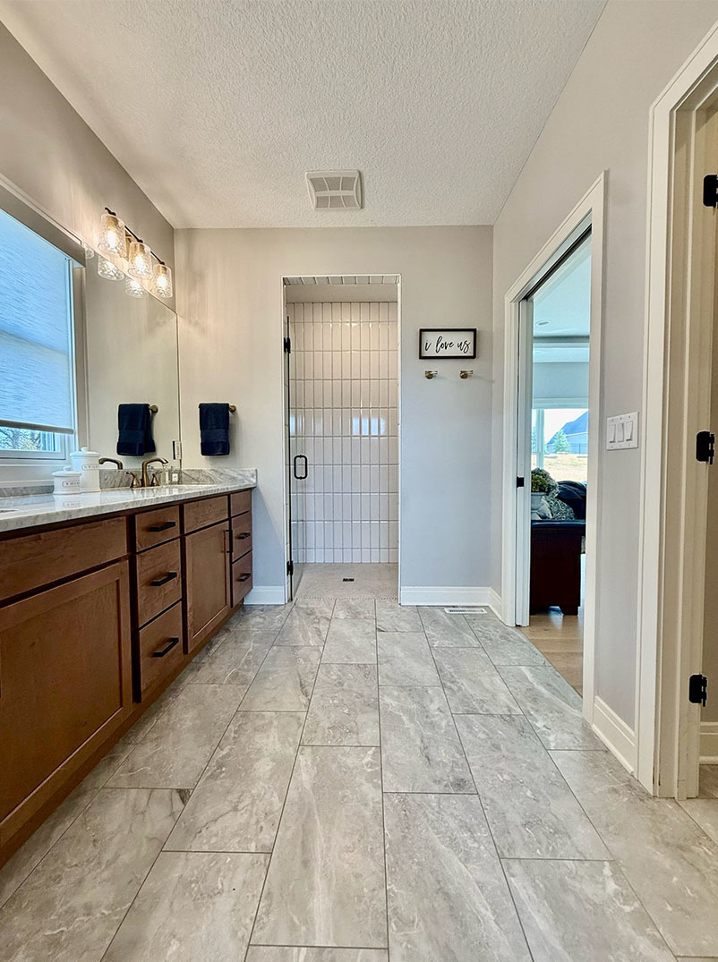 5077 Oak Rdg Court Bettendorf, IA 52722 - Photo 15 of 35 a view of a kitchen with a sink and dishwasher with white walls