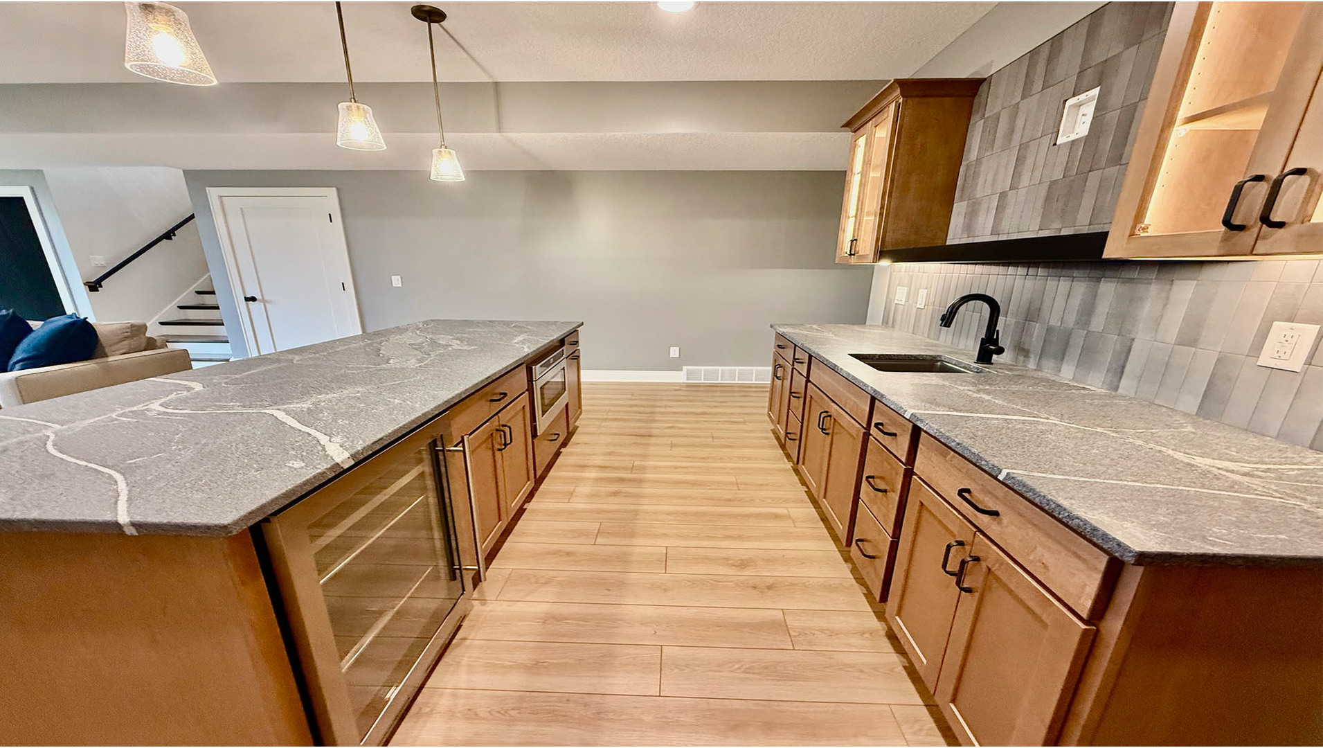 5077 Oak Rdg Court Bettendorf, IA 52722 - Photo 28 of 35 a kitchen with a sink a stove and cabinets