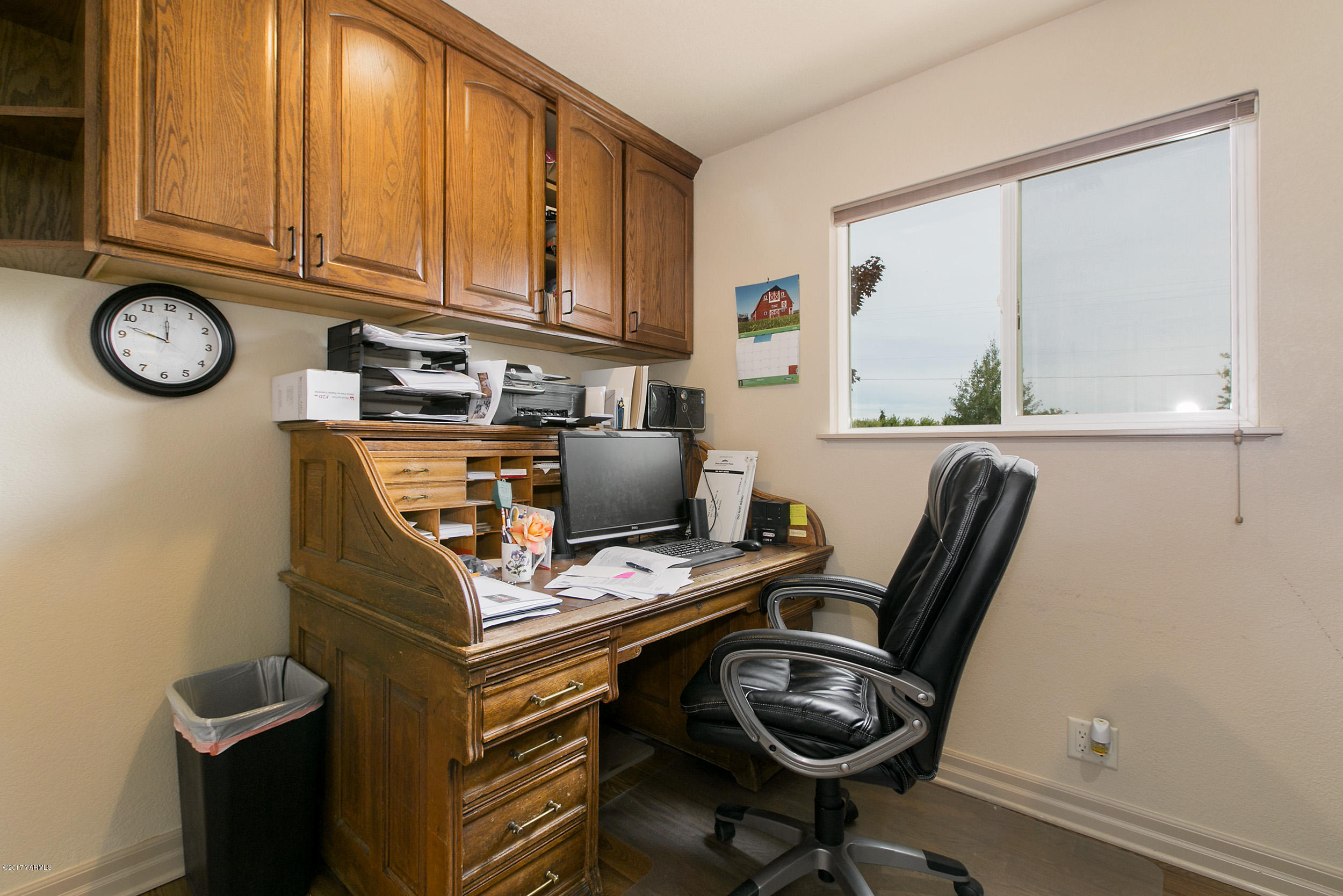 370 Blue Goose Road Zillah, WA 98953 - Photo 16 of 31 a view of a workspace with furniture and a window