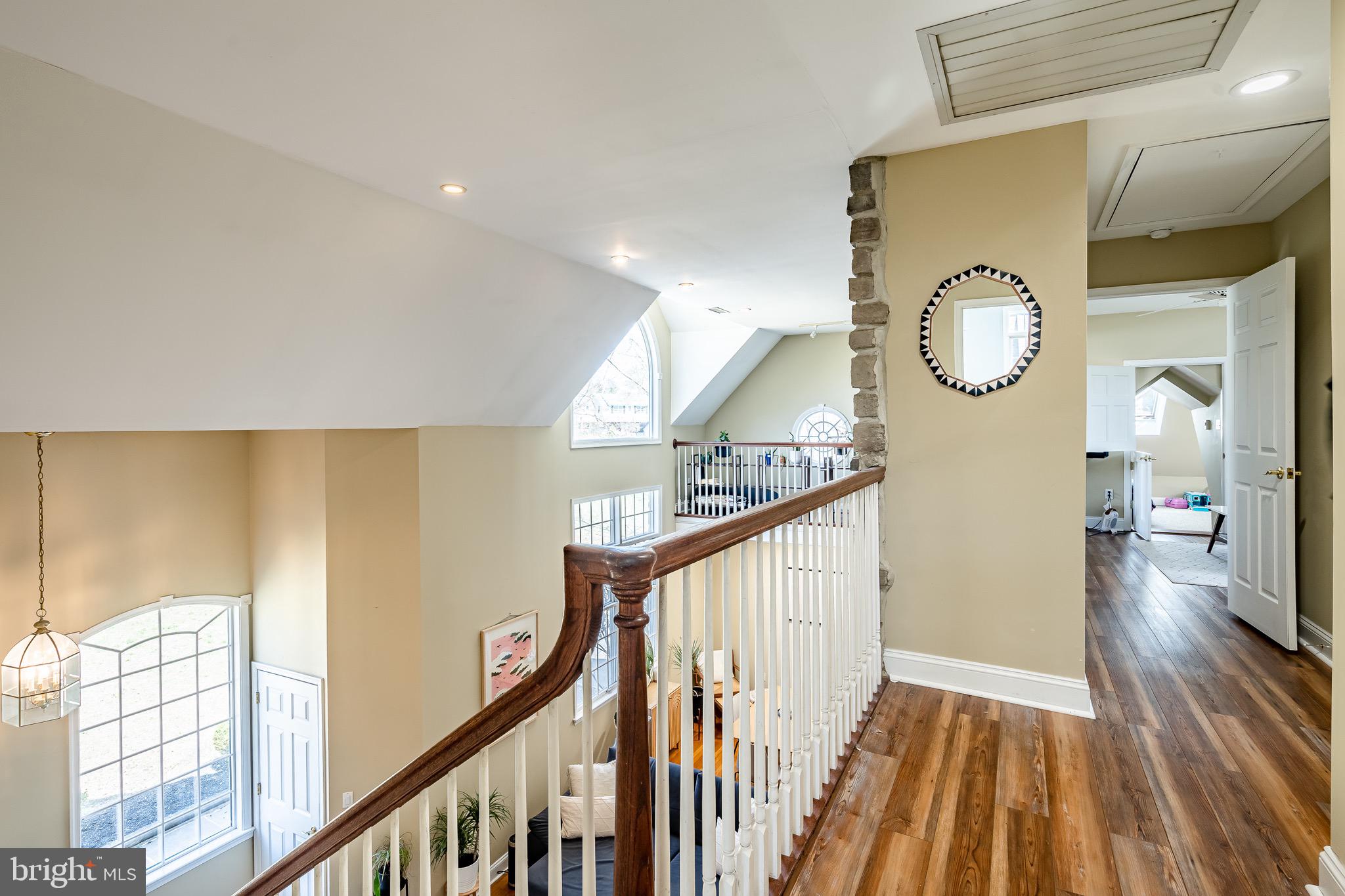 108 Devonwood Lane Devon, PA 19333 - Photo 13 of 55 a view of a hallway view with wooden floor and staircase