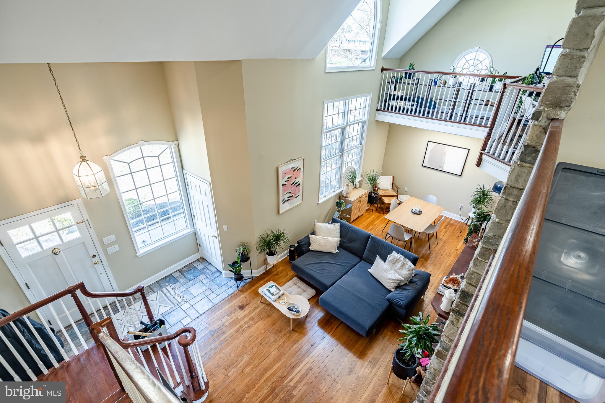 108 Devonwood Lane Devon, PA 19333 - Photo 22 of 55 a living room with furniture and a wooden floor
