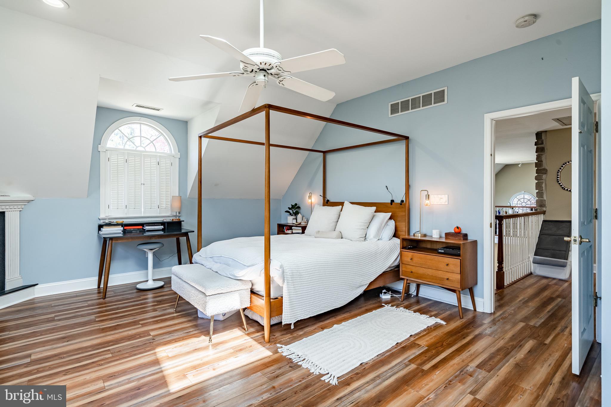 108 Devonwood Lane Devon, PA 19333 - Photo 29 of 55 a bedroom with a bed and wooden floor