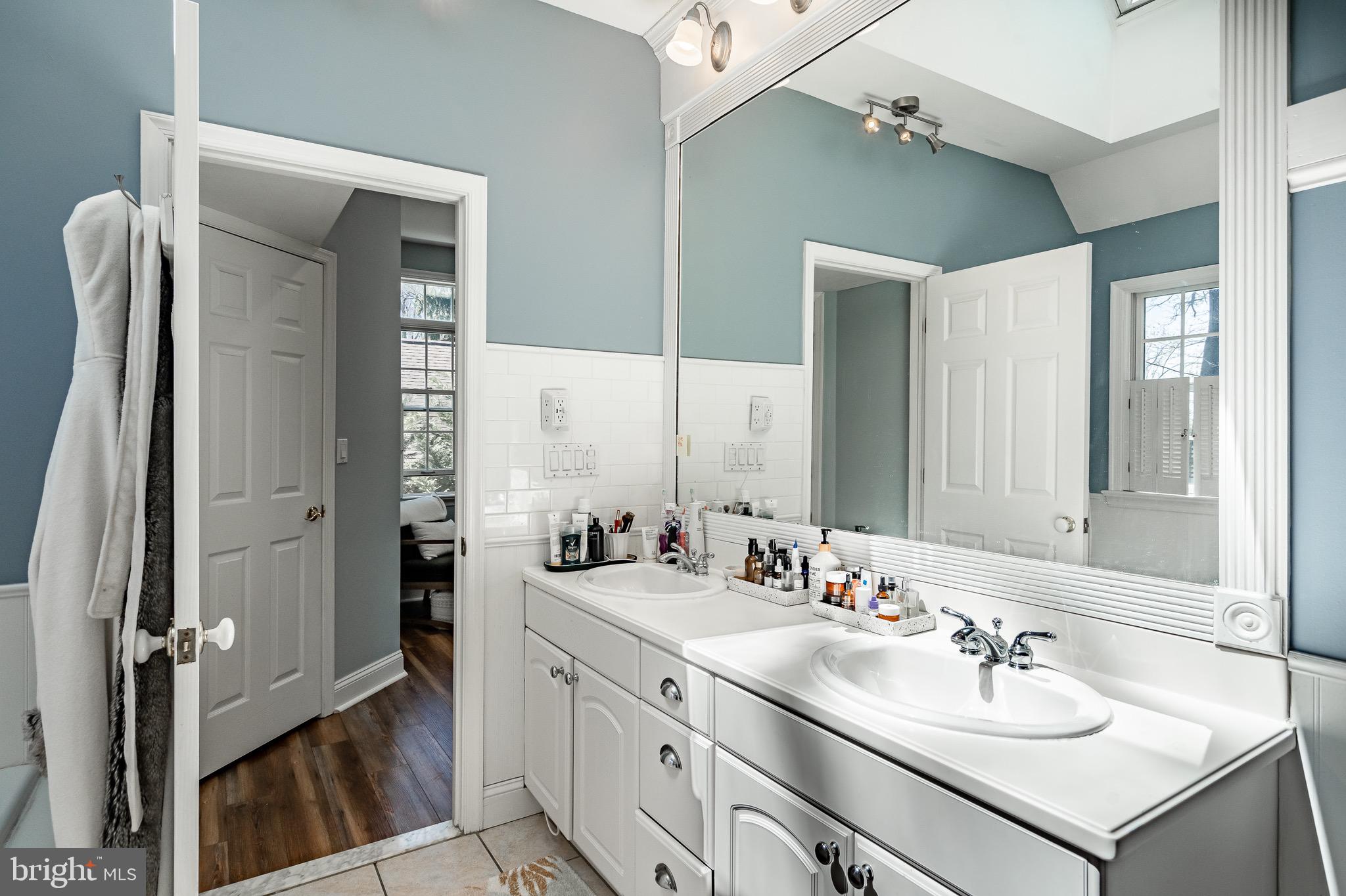 108 Devonwood Lane Devon, PA 19333 - Photo 34 of 55 a bathroom with a double vanity sink mirror and