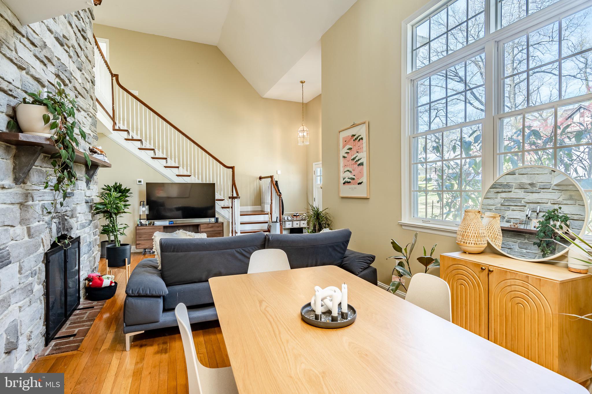108 Devonwood Lane Devon, PA 19333 - Photo 8 of 55 a living room with furniture a flat screen tv and a flat screen tv