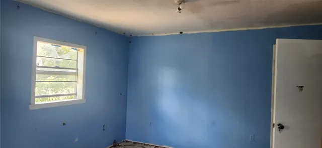 an empty room with a window