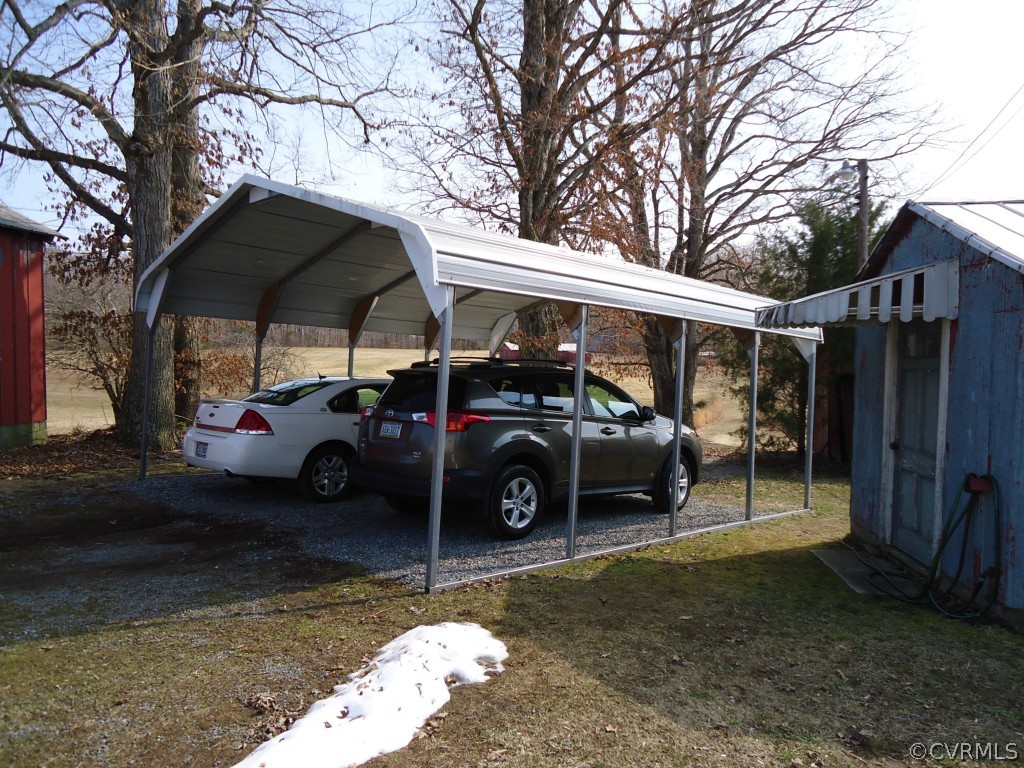 1972 Willow Brook Road Bumpass, VA 23024 - Photo 11 of 18 a car parked in front of a house