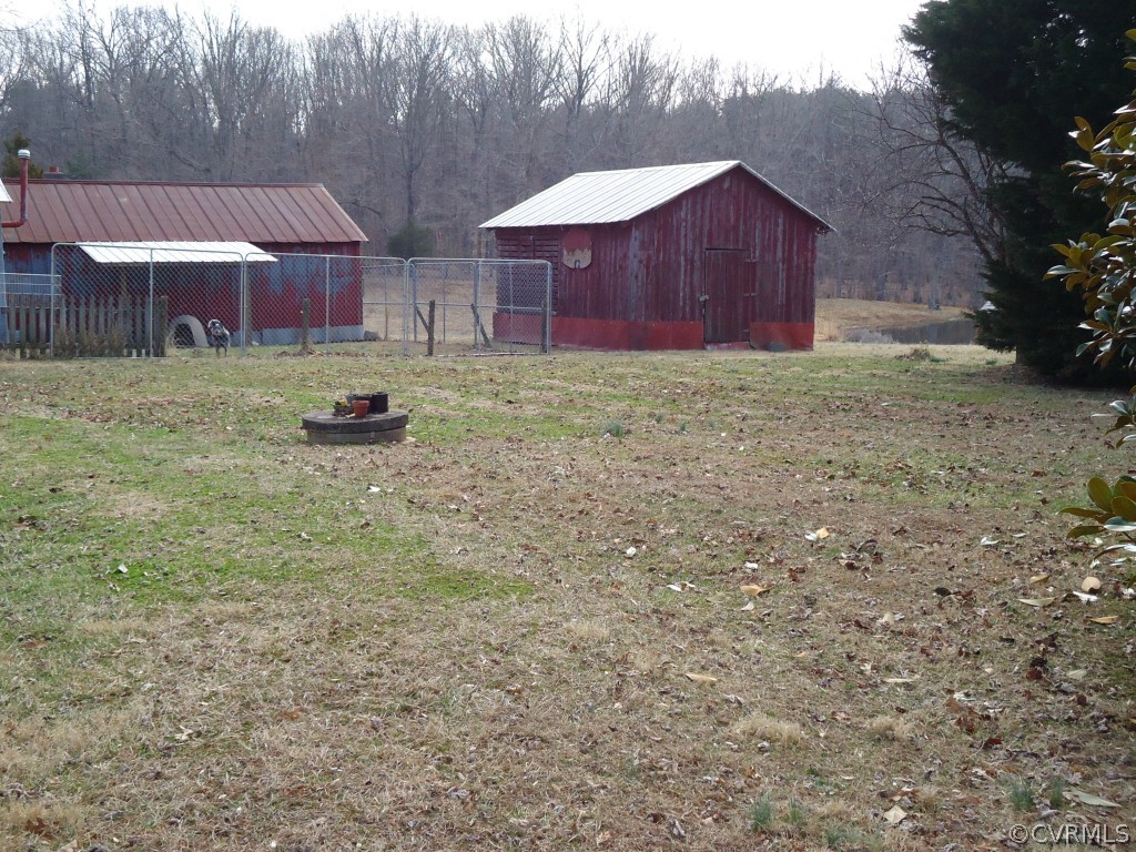 1972 Willow Brook Road Bumpass, VA 23024 - Photo 13 of 18 a view of a house with a yard