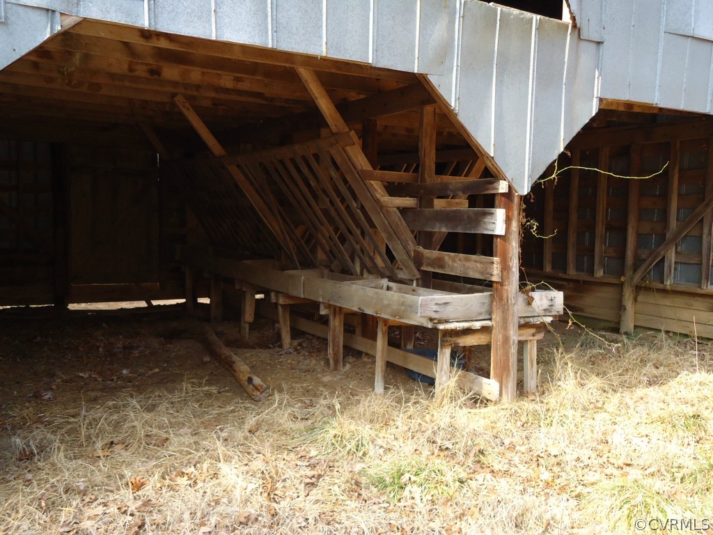1972 Willow Brook Road Bumpass, VA 23024 - Photo 17 of 18 a backyard of a house with table and chairs