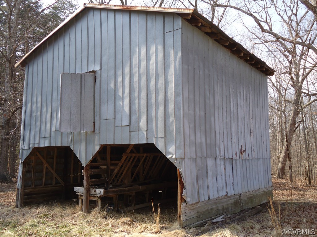 1972 Willow Brook Road Bumpass, VA 23024 - Photo 18 of 18 a couple of cars parked in front of a house