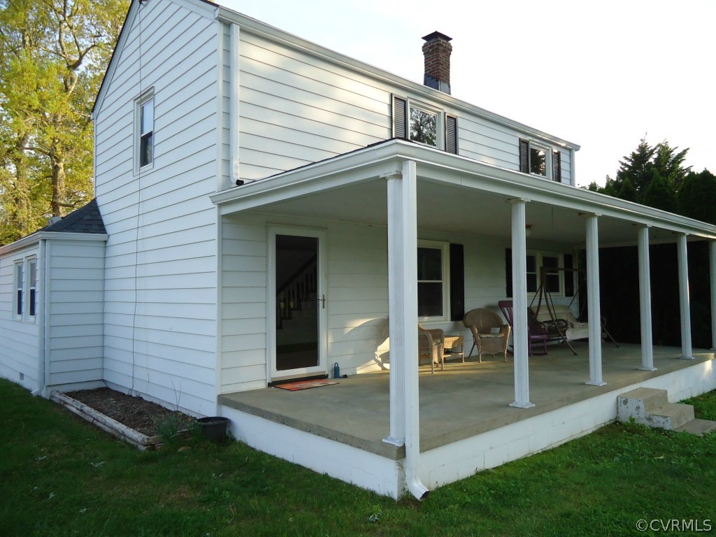 1972 Willow Brook Road Bumpass, VA 23024 - Photo 2 of 18 a front view of a house with a yard