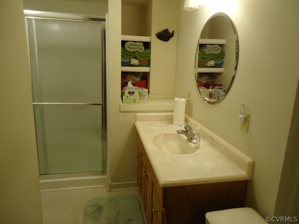 1972 Willow Brook Road Bumpass, VA 23024 - Photo 8 of 18 a bathroom with a sink and mirror
