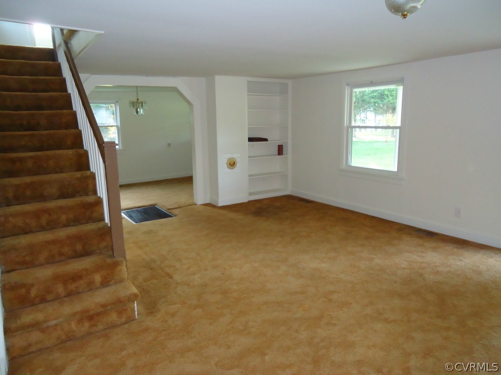 1972 Willow Brook Road Bumpass, VA 23024 - Photo 10 of 18 wooden floor in an empty room with a window