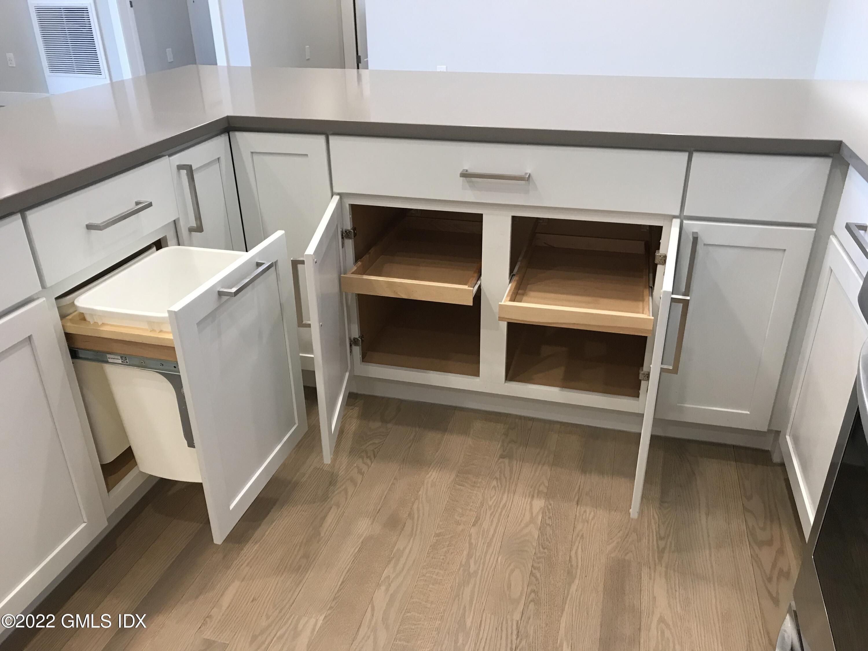 56 Old Field Point Road, Unit 6 Greenwich, CT 06830 - Photo 13 of 28 a view of an empty room with an empty space