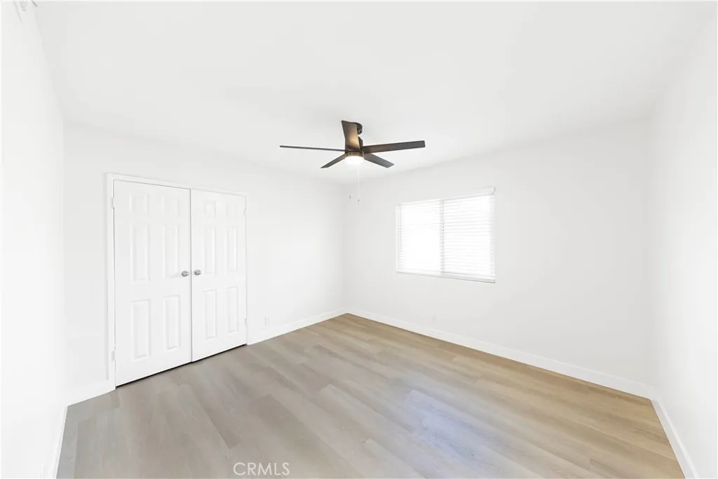 2477 Orange, Unit A Costa Mesa, CA 92626 - Photo 13 of 21 a view of a room with wooden floor